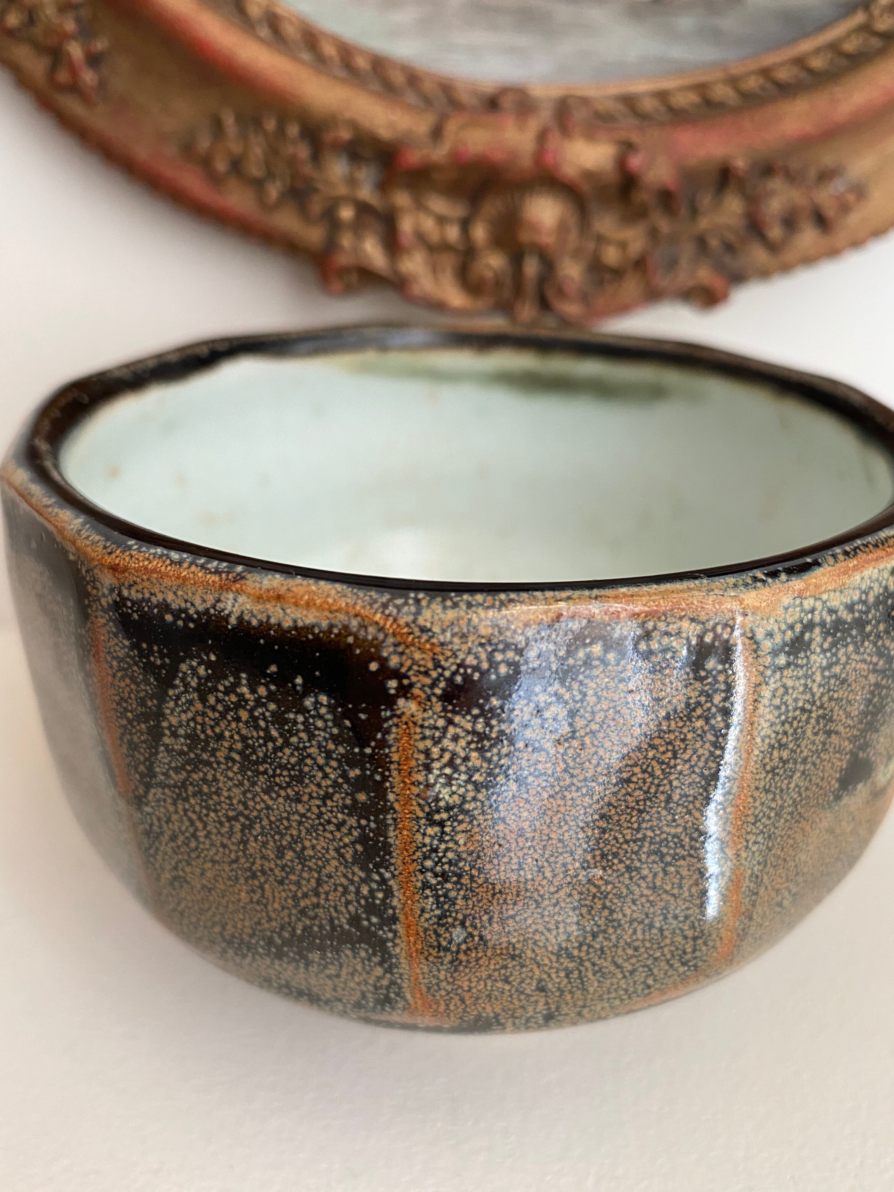 Glazed ceramic bowl signed