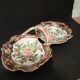 Double porcelain servant with floral decoration, polychrome and gilding – f
