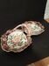 Double porcelain servant with floral decoration, polychrome and gilding – f