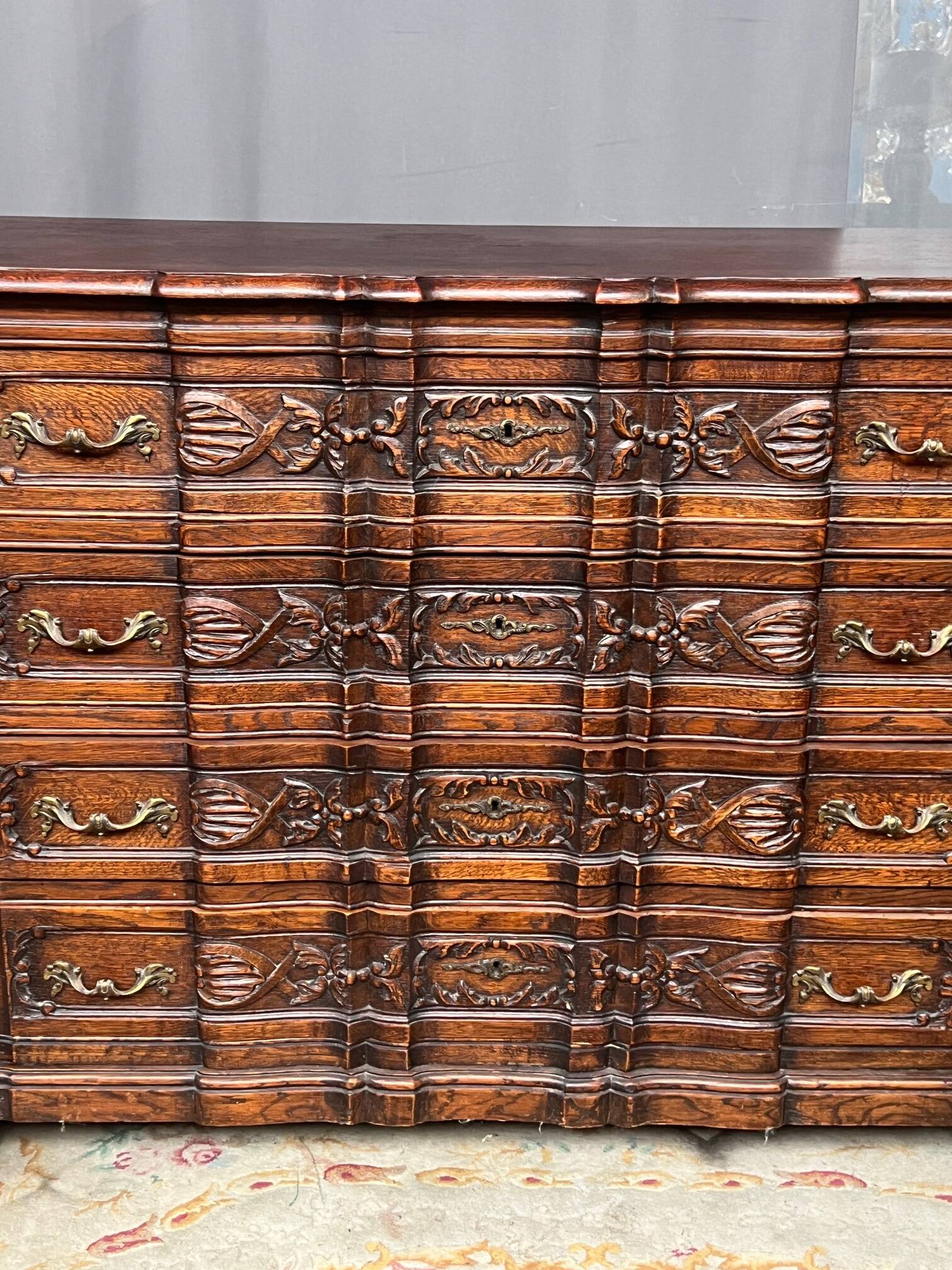 Luxurious carved Neo-Renaissance chest of drawers.