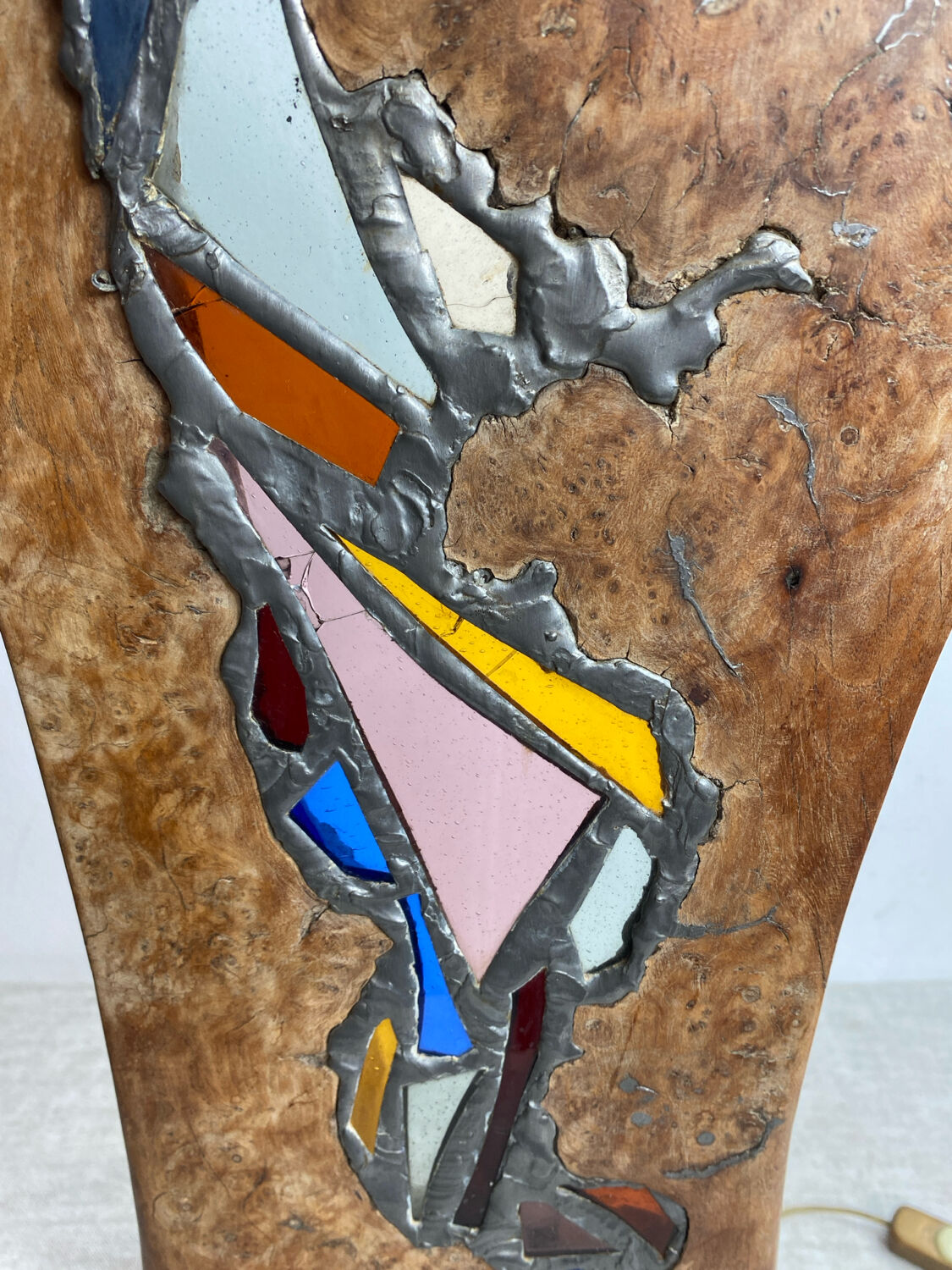 Carved wooden lamp and stained glass