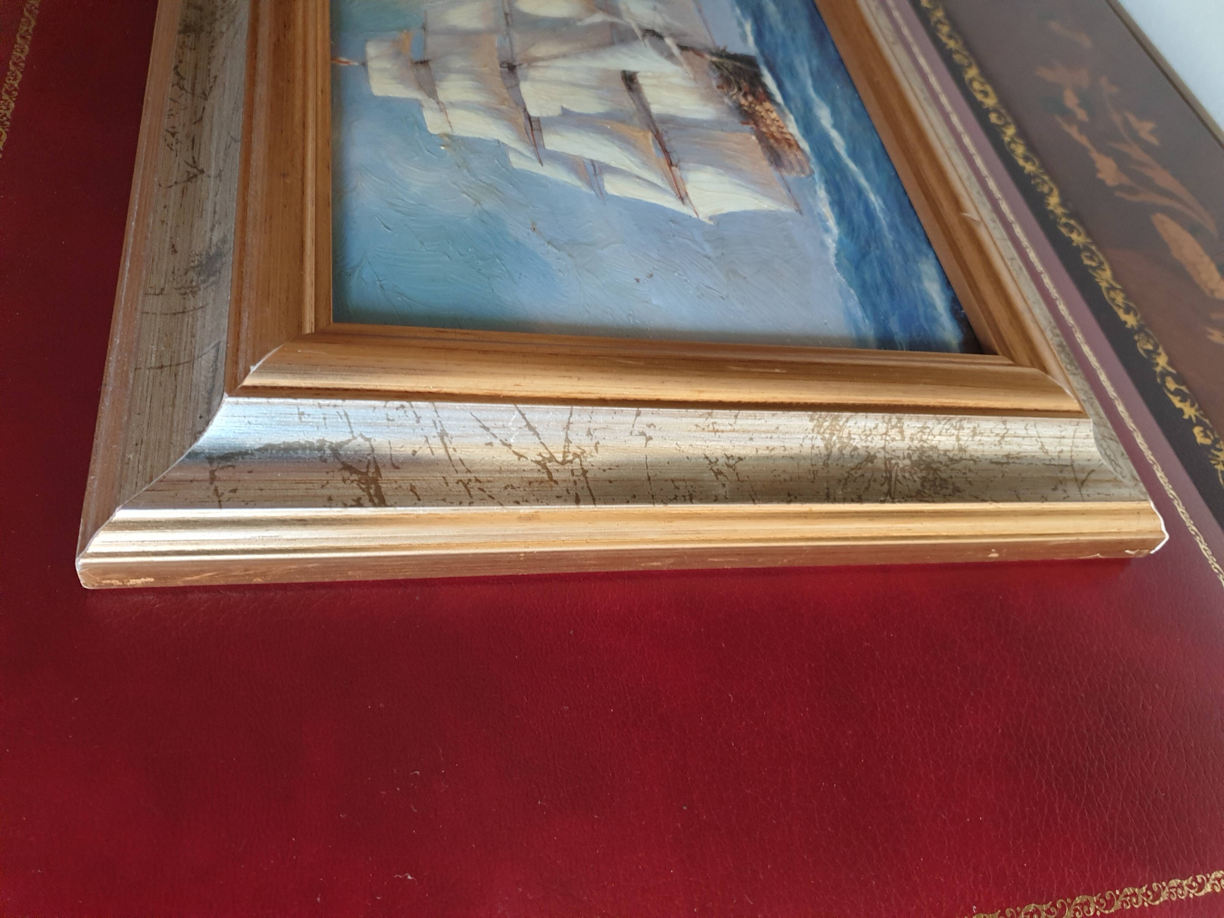Set of two paintings with identical gold and silver frames