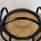 Curved wood and cane armchair called "Le Corbusier"
