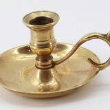 Old brass hand candle holder