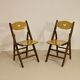 Pair of vintage folding chairs year 50 sculpted backrest.