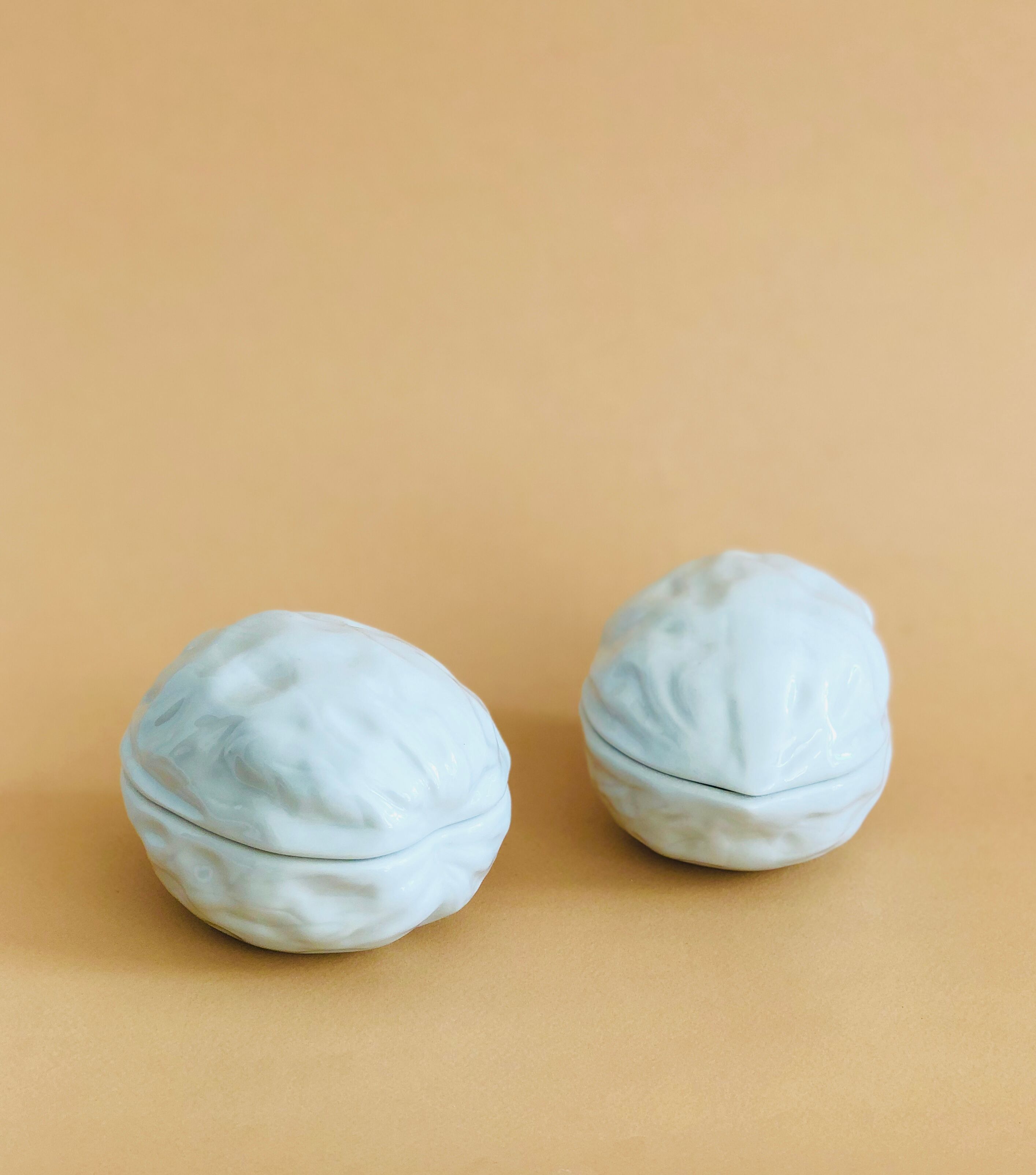 Pair of Limoges porcelain nut boxes