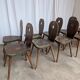 8 chaises brutalistes vintage en bois