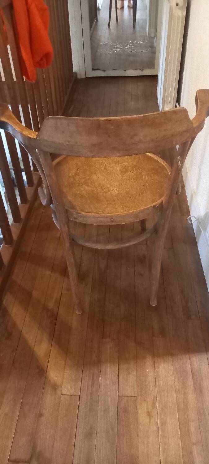 Curved wood armchair