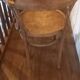 Curved wood armchair