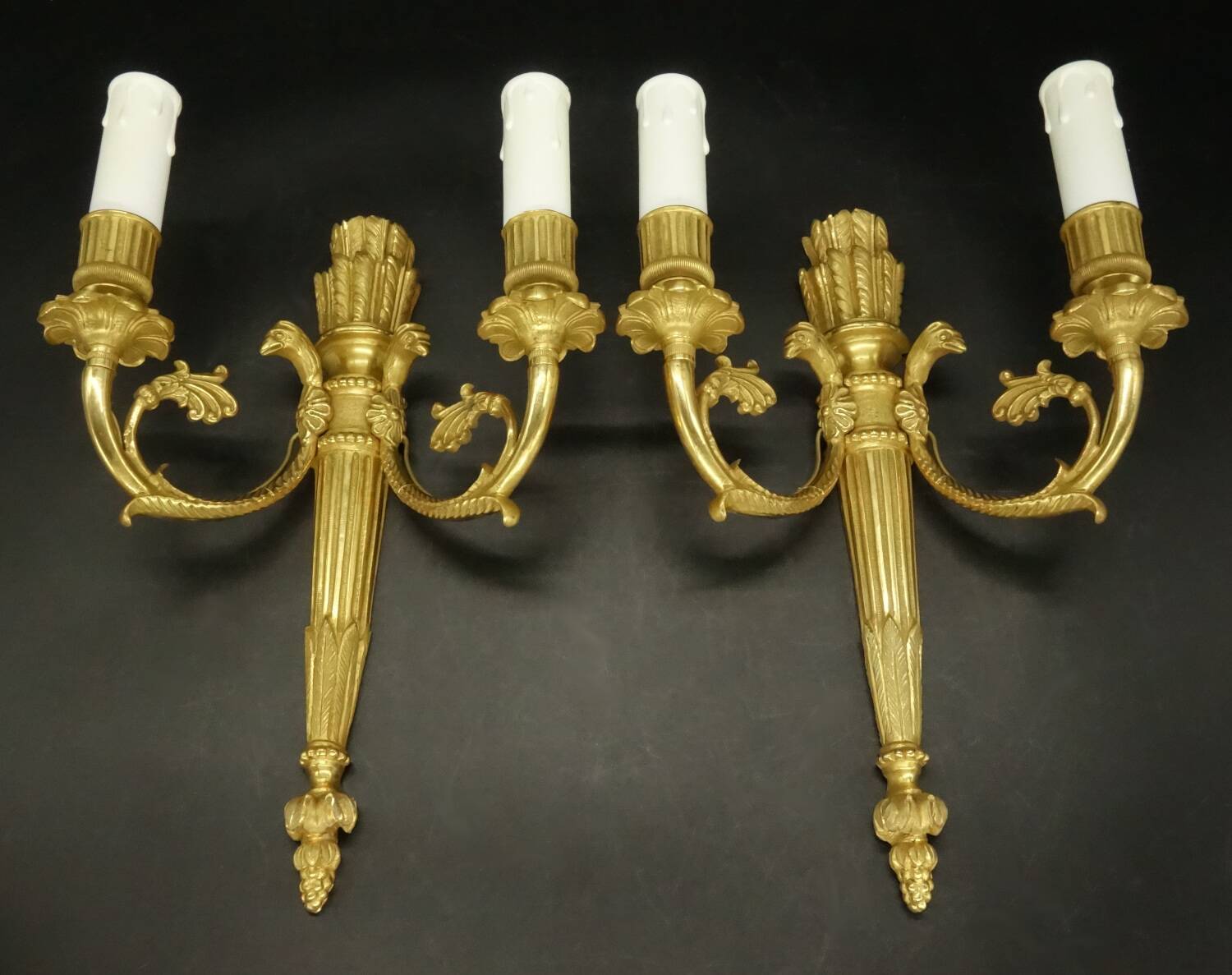 Pair of wall sconces, quiver and eagle heads, Louis XVI style - gilded bronze