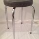 Table in white Formica, 3 chairs and 1 stool in gray leatherette