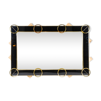 Mirror in black glass and brass trim 182x121 cm