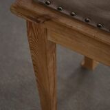 A pair of antique Danish pine stools from the late 19th century.