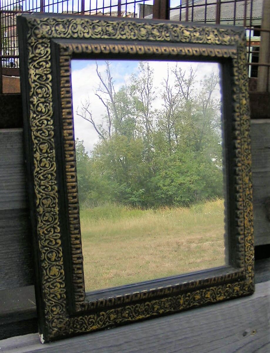 Napoleon III mirror in repelled brass