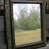 Napoleon III mirror in repelled brass