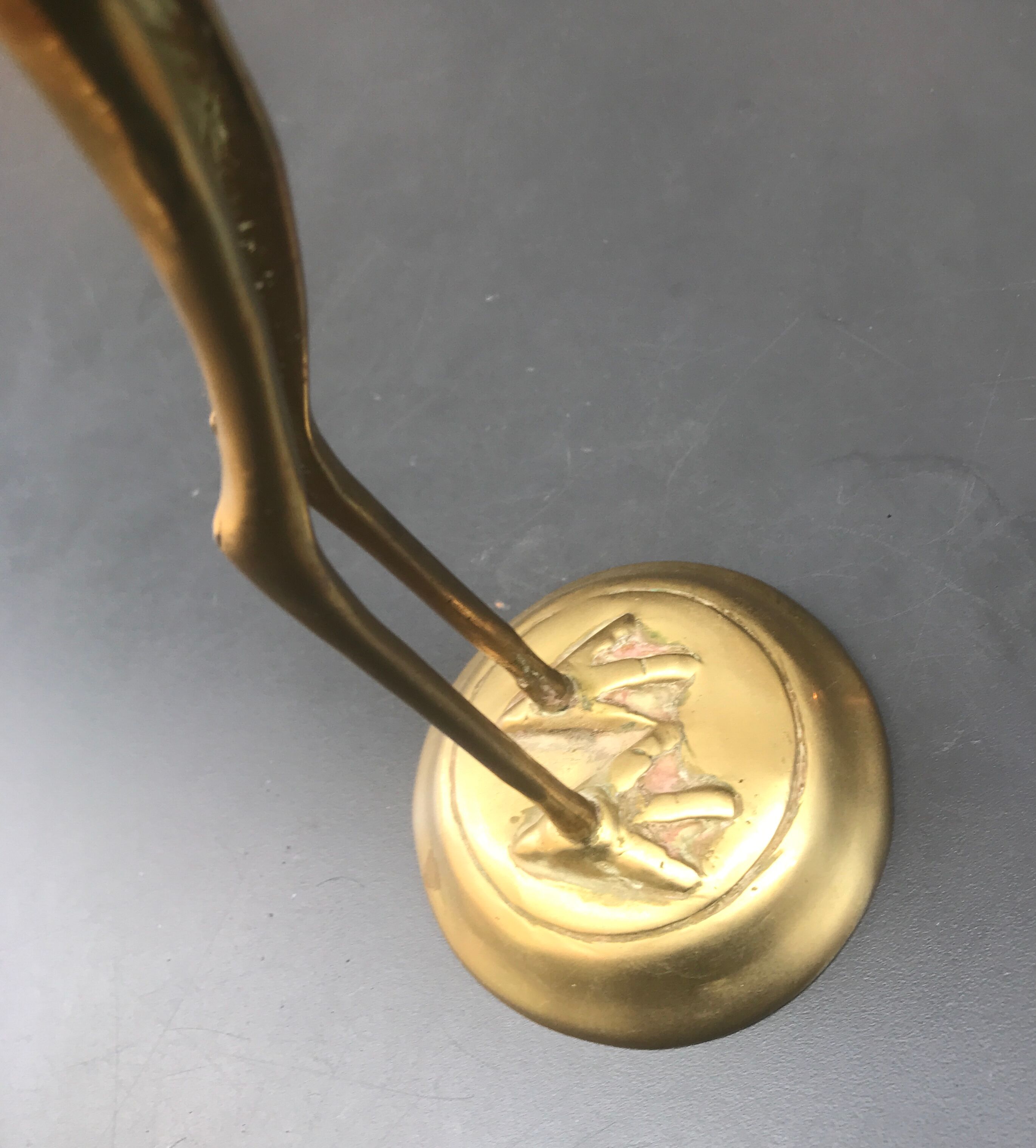 Large brass stilt walker