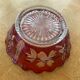 Red and transparent glass bowl with floral motifs and vintage wheat cobs