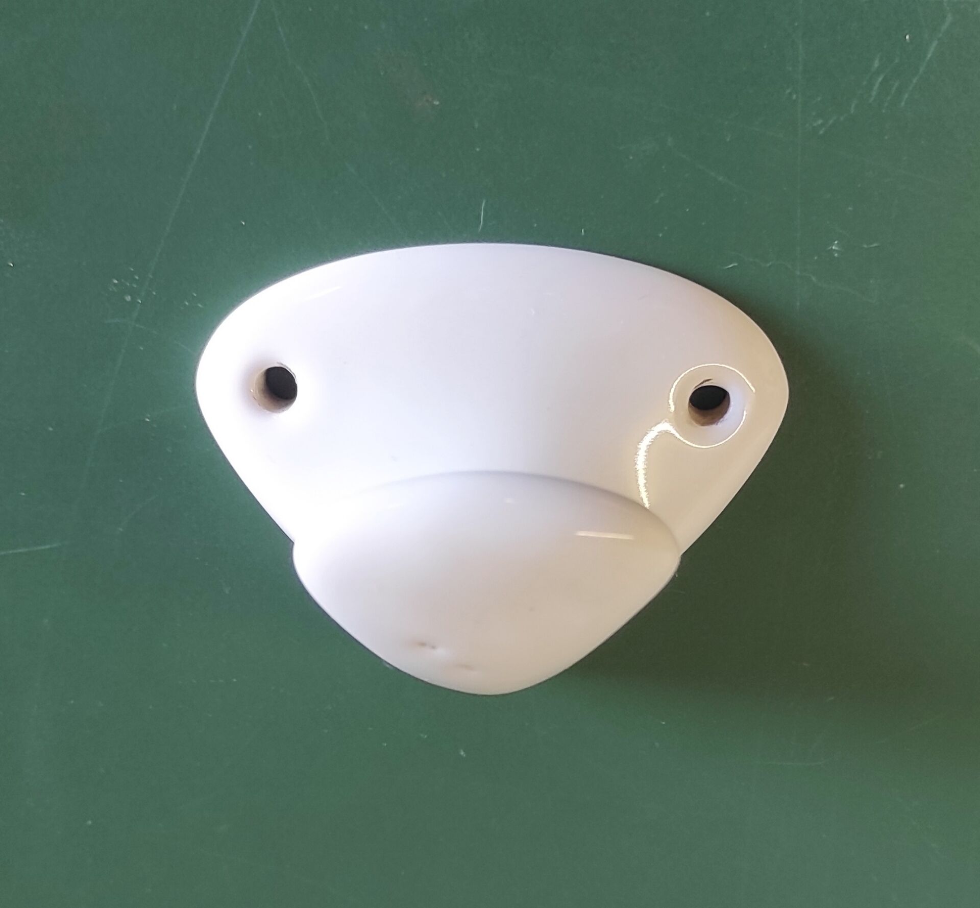 Wall-mounted coat hook in porcelain - mid 20th century