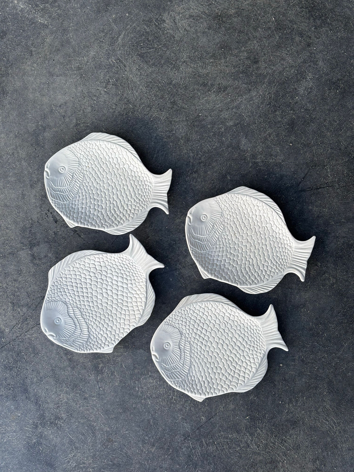 Lot de 4 assiettes poisson en faïence blanche