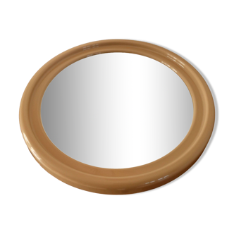 Large round mirror in pink beige plastic from the 70s