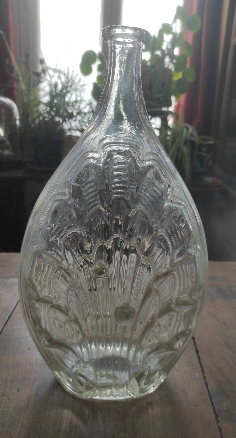 Molded glass bottle