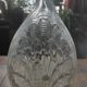 Bouteille en verre moulé