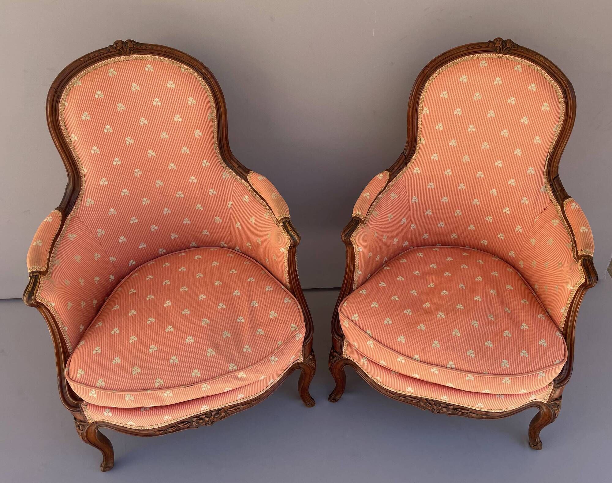 Pair of Louis XV period bergeres in walnut