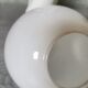 White ceramic hand wall lamp