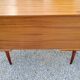 60s desk in golden blond mahogany with conical coffered feet