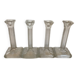 Four old square molded glass candlesticks