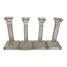 Four old square molded glass candlesticks