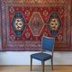Tapis mural aux motifs orientaux.