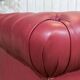 Chesterfield 2-seater leather sofa, modern production from the 2000s.