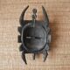 Decorative mask hand carved in tribal ethnic painted wood