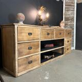 Old piece of trade furniture with chestnut drawer