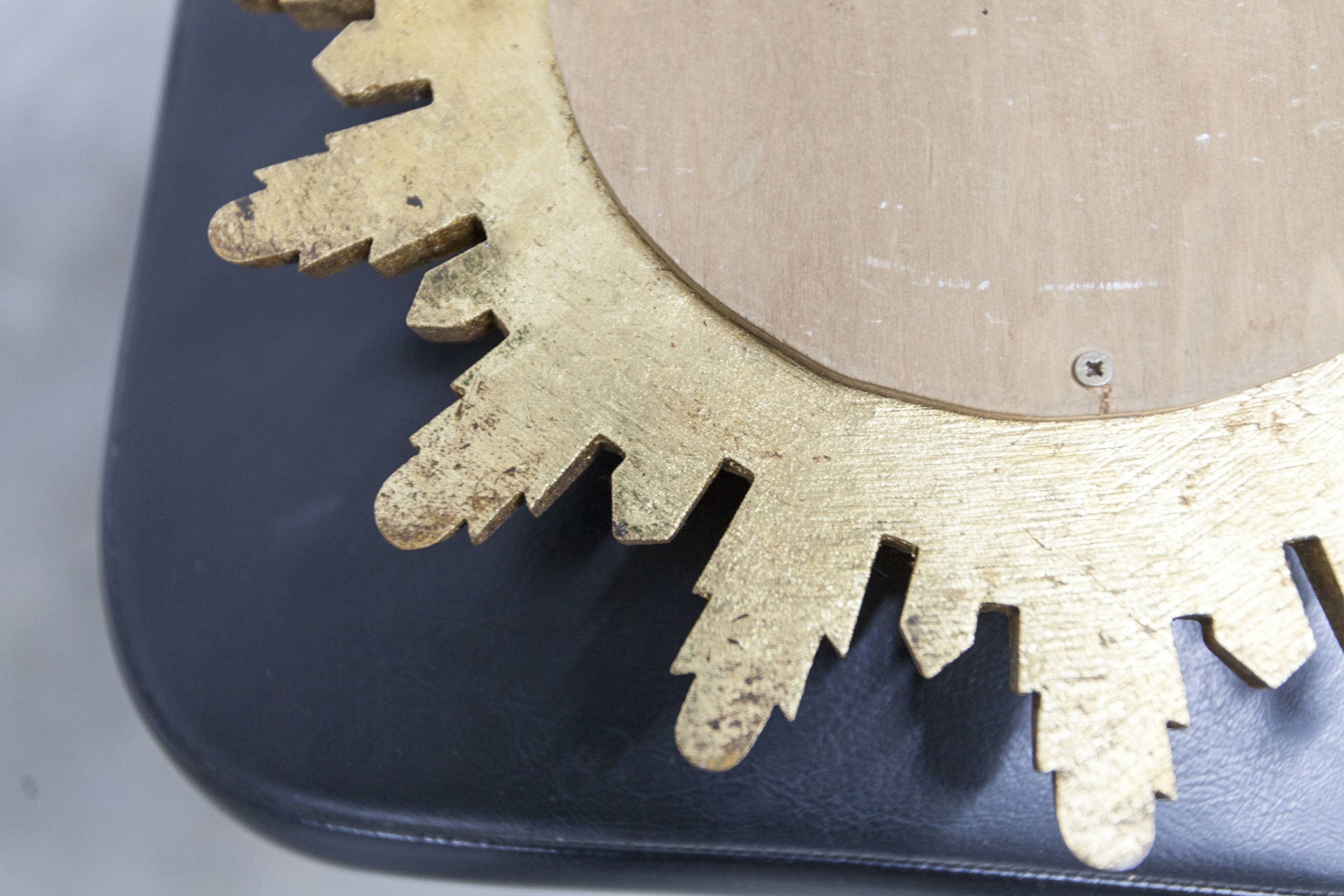 Vintage 1970s convex witch's eye sunburst mirror