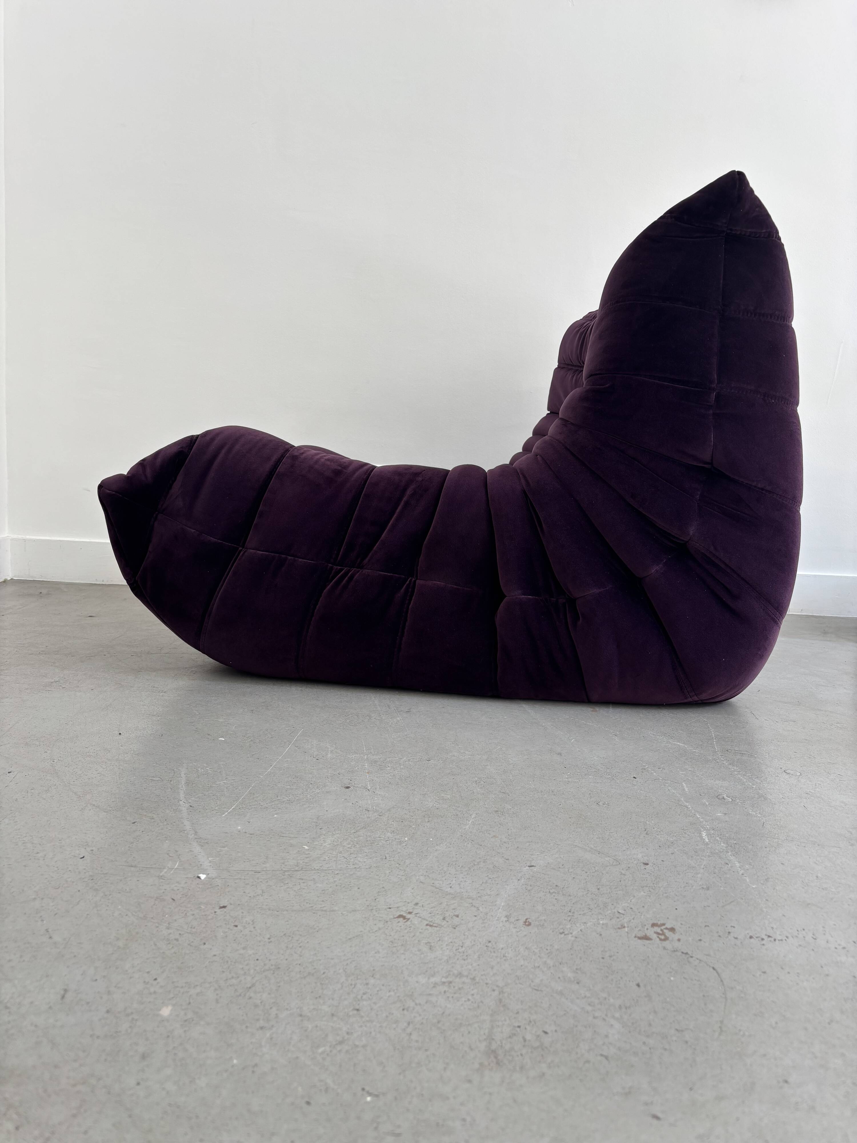 Purple "Togo" armchair by Michel Ducaroy