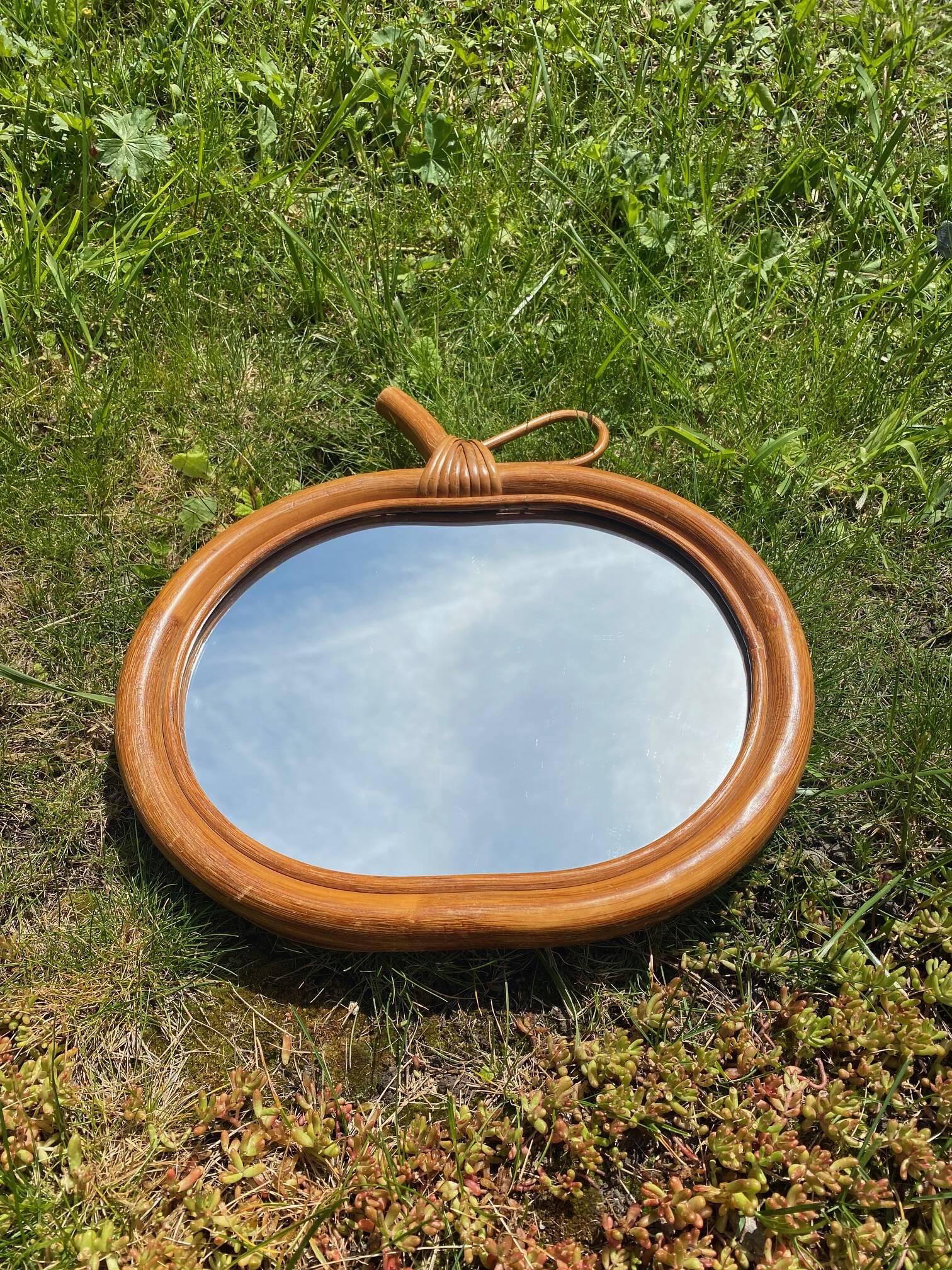 Vintage rattan apple mirror