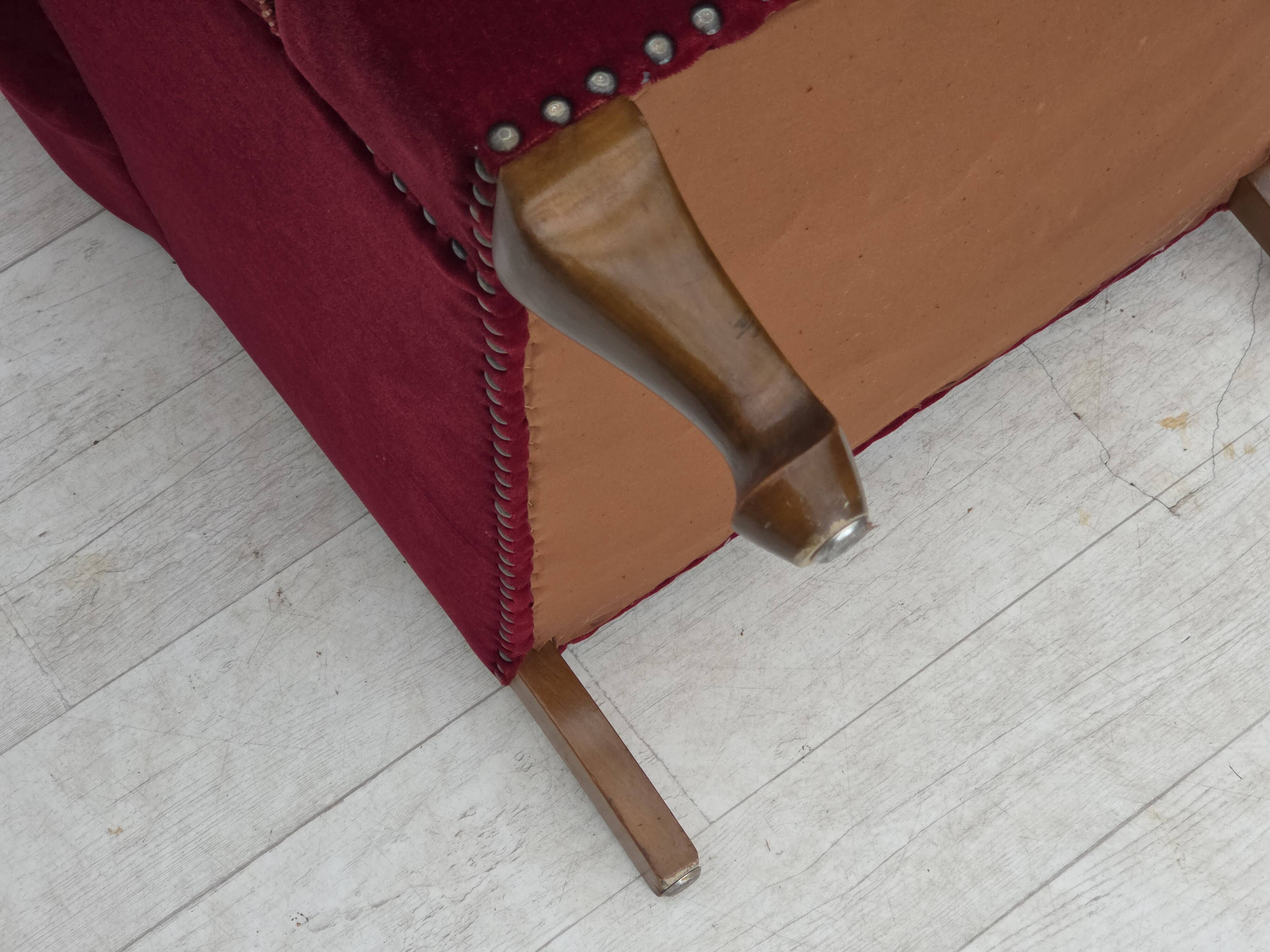 1960s, Danish highback wingback armchair, cherry-red furniture velour.