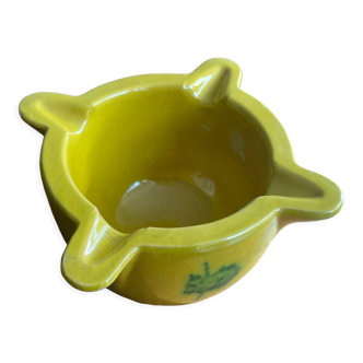 Yellow ceramic mortar with green patterns