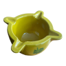 Yellow ceramic mortar with green patterns
