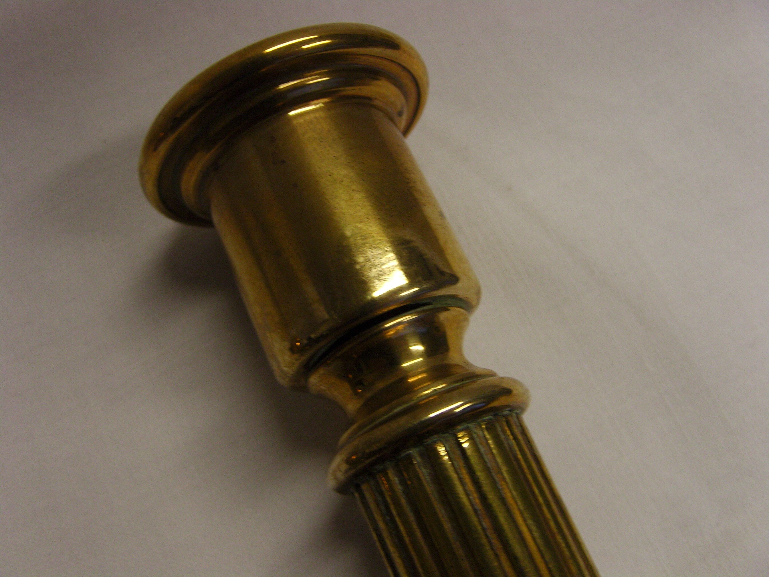 Pair of fluted brass candlesticks Louis XVI style
