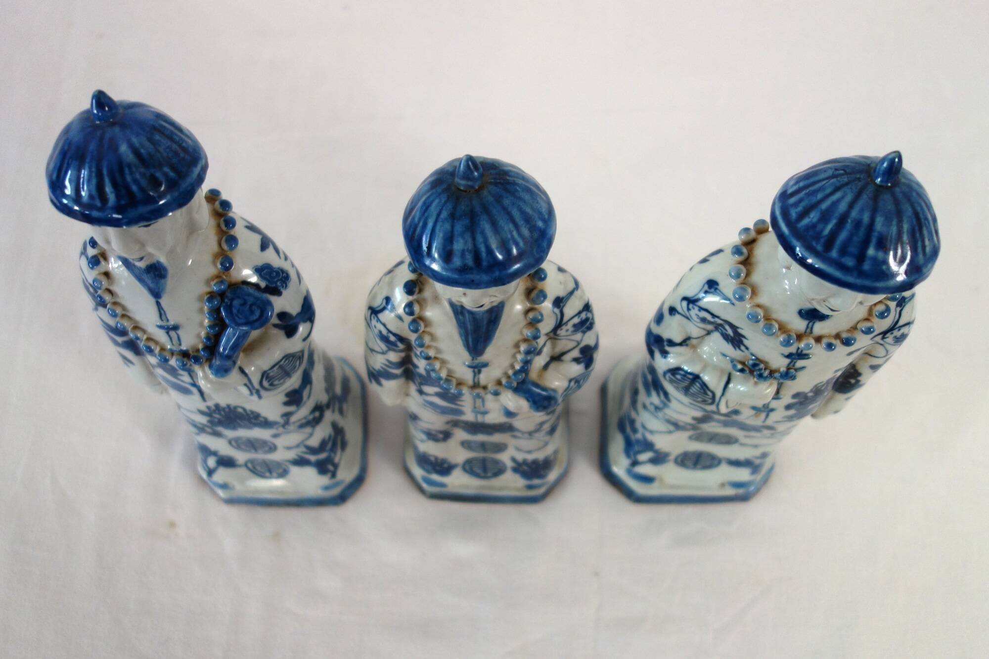 3 figurines of emperors from the Qing dynasty, China, early 20th century.