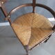 Old straw corner armchair