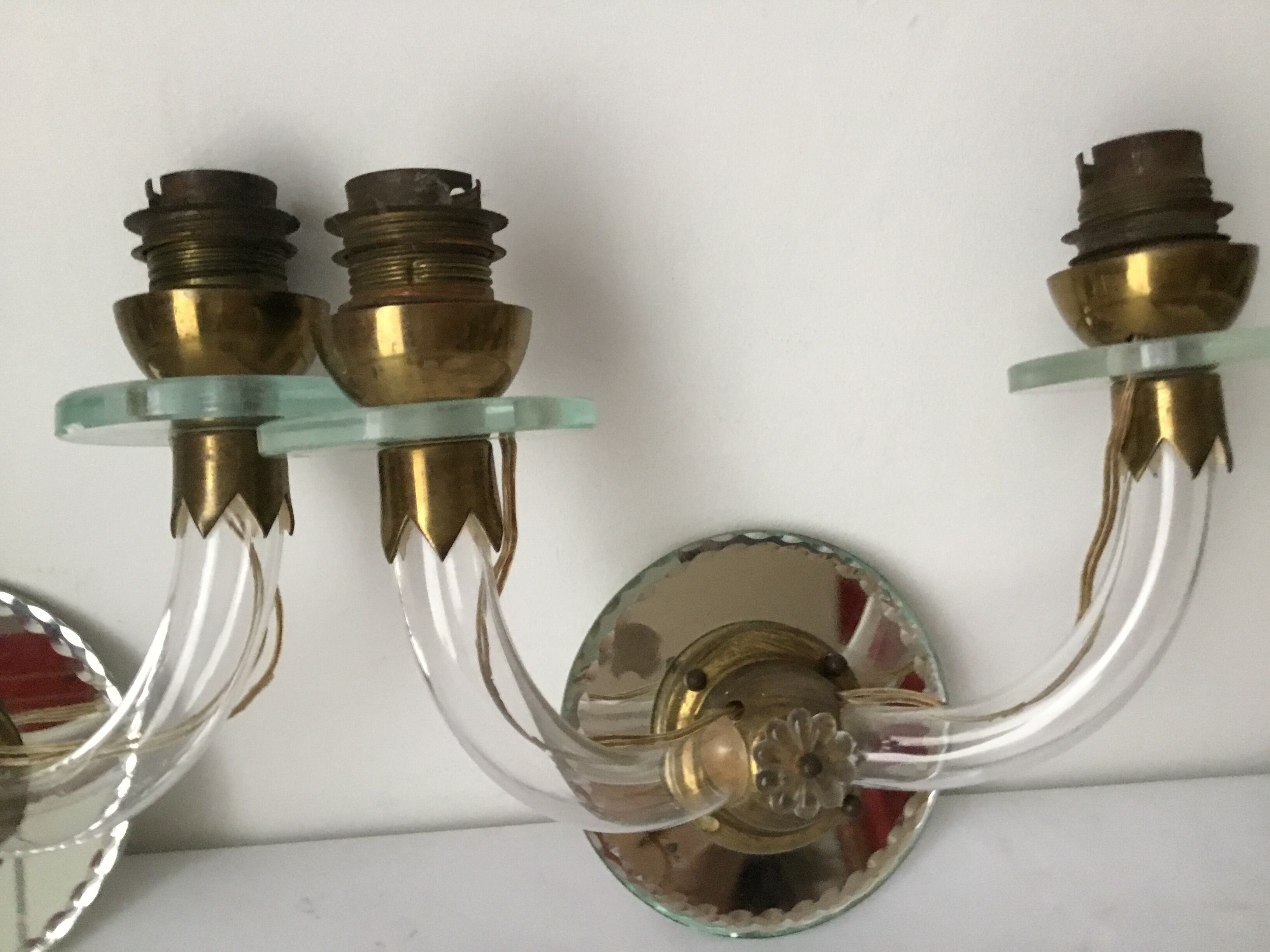 Pair of glass and mirror sconces