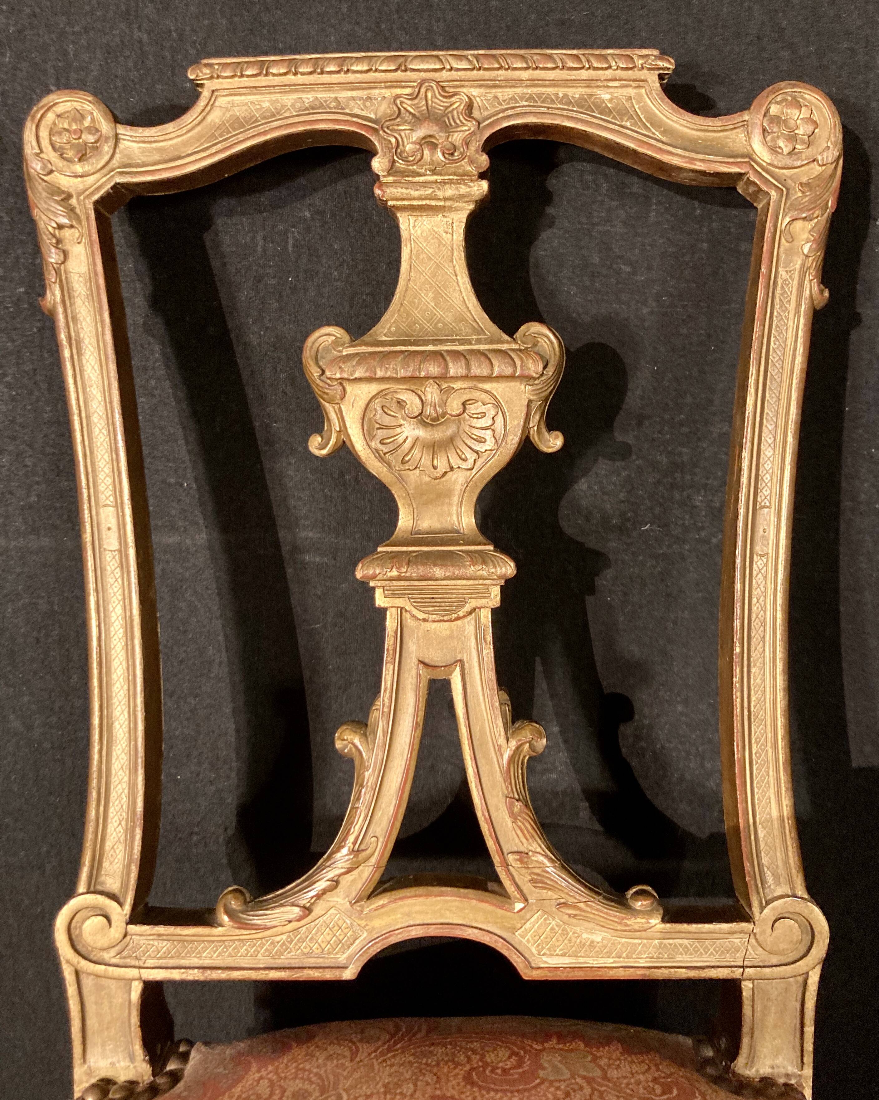 Pair of gilded wooden chairs