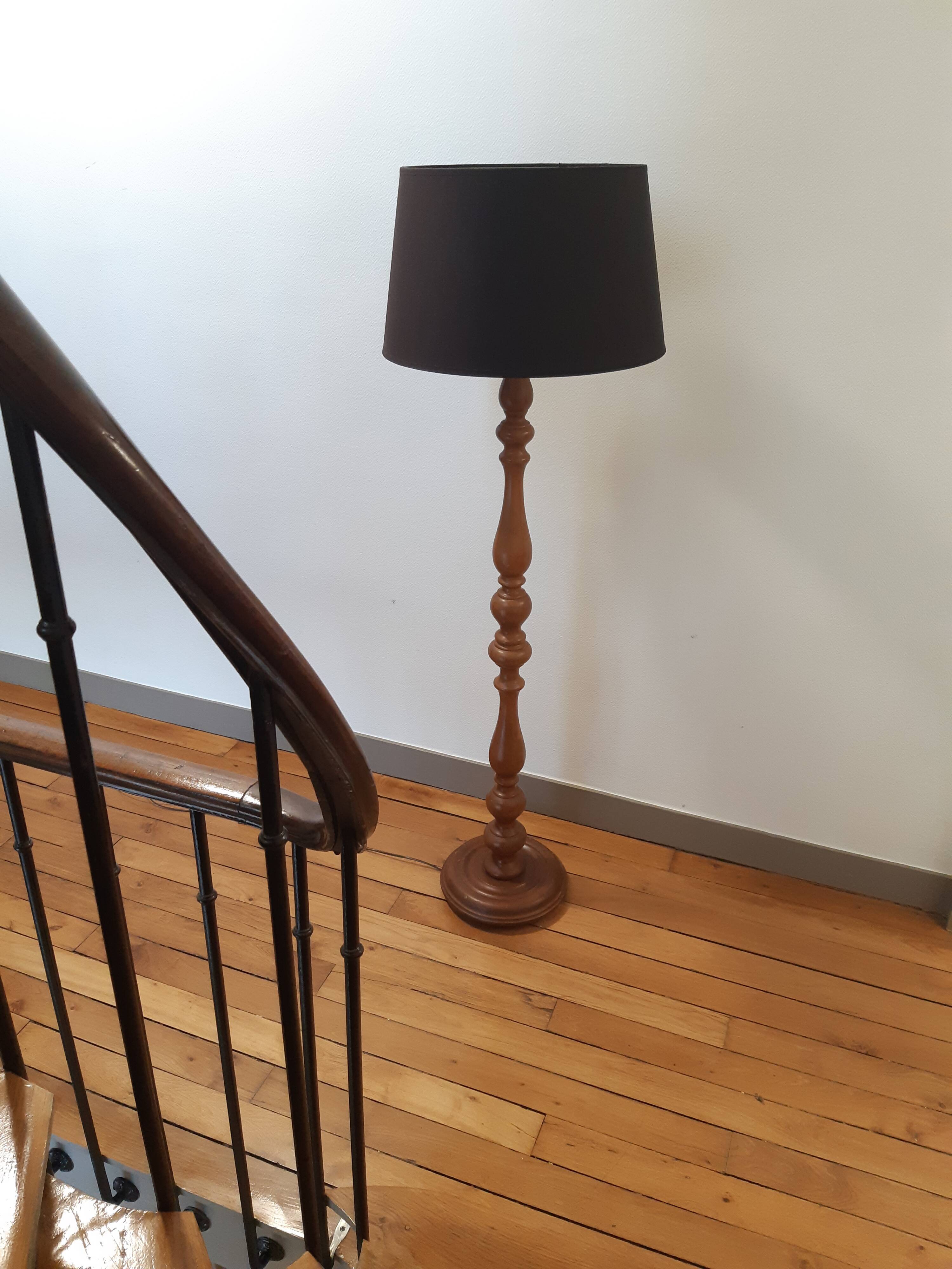 Carved wooden lamppost