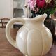 Enamelled ball pitcher