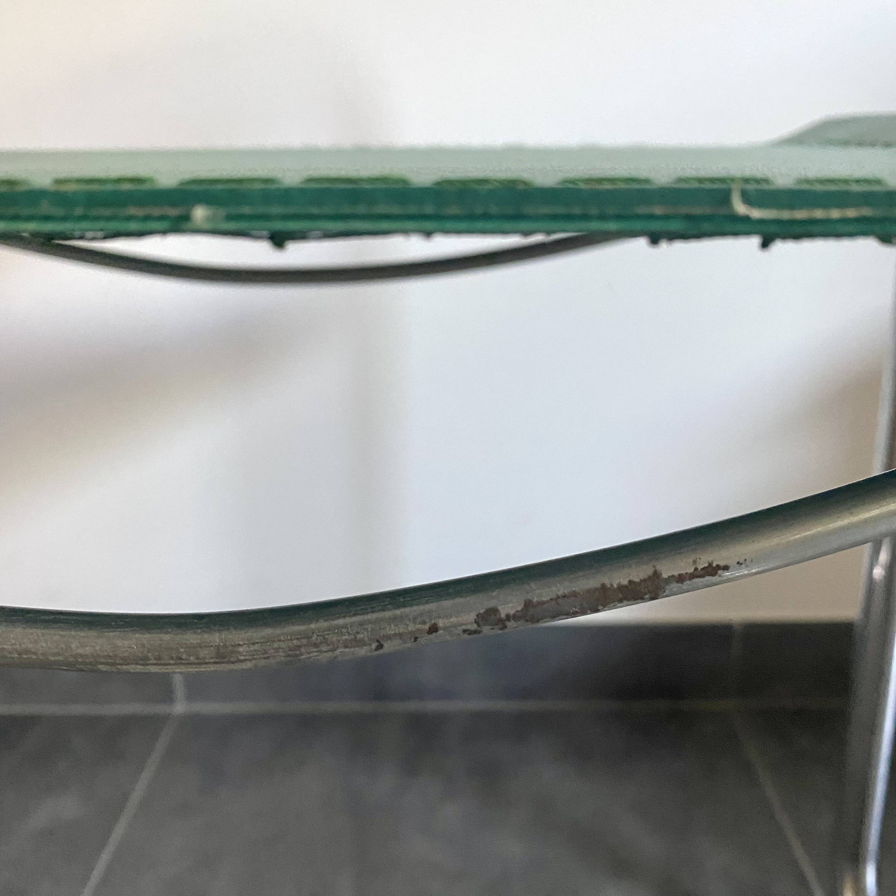 Pair of faux leather and chrome armchairs