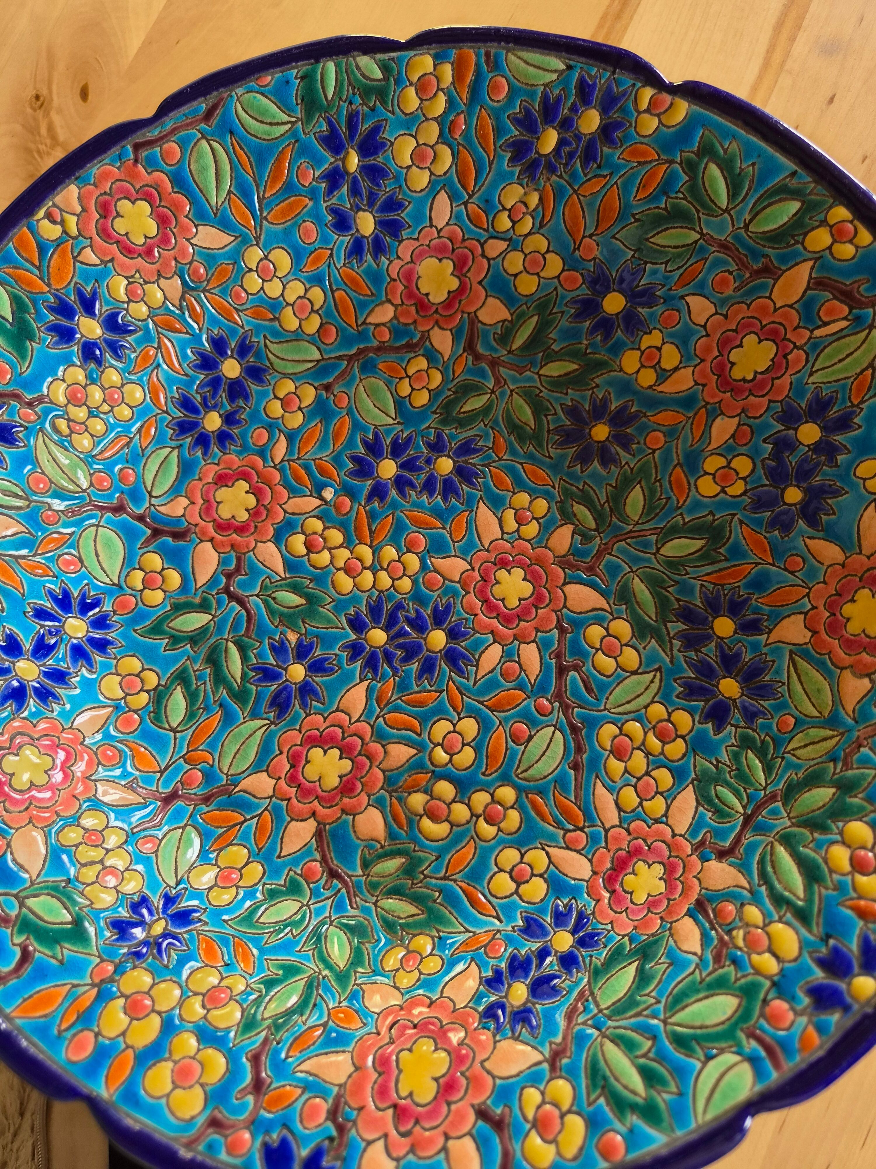 Plate in Émaux de Longwy with no cracks or chips.
